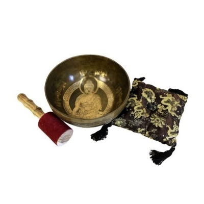 Tigela tibetana metálica dourada com gravura budista, almofada preta com dragões dourados e pegador com tecido vermelho