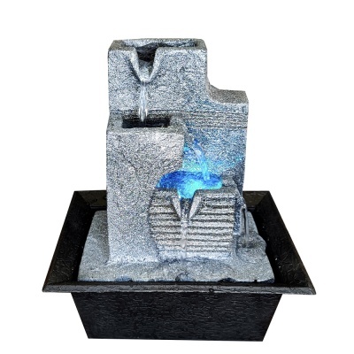 Fonte decorativa interior cinzenta com luzes LED azuis e base preta