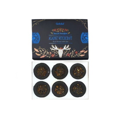 Caixa preta de incenso Goloka com seis discos de incenso pretos e dourados.