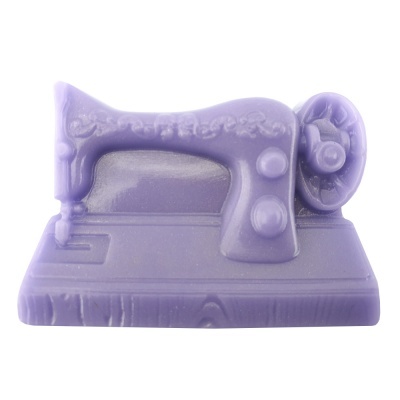 Sabonete roxo em forma de máquina de costura