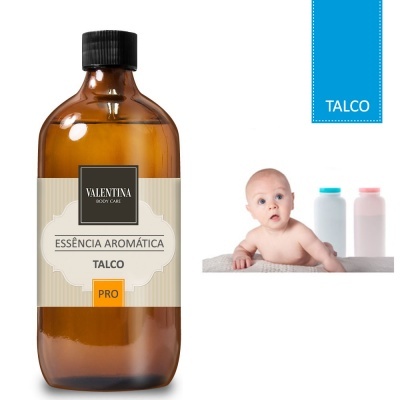 Frasco âmbar de essência aromática talco com rótulo e imagem de bebé e frascos ao fundo