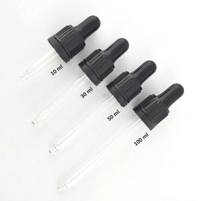 Quatro conta-gotas de vidro com capacidade variada