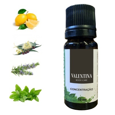 Frasco pequeno de óleo essencial Valentina Body Care de concentração 10 ml com plantas ao lado.