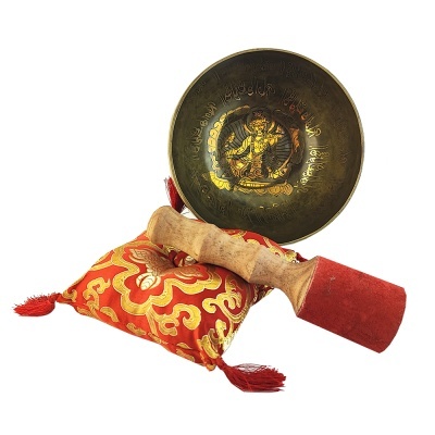 tigela tibetana em metal com almofada decorativa e bastão