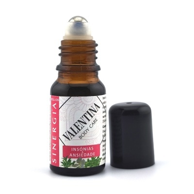Frasco de roll-on âmbar com tampa preta e rótulo com indicações para insónias e ansiedade