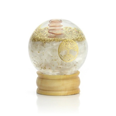 Esfera decorativa de vidro com base de madeira e partículas douradas