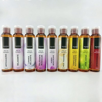 Oito frascos de óleo de massagem VALENTINA em várias cores alinhados