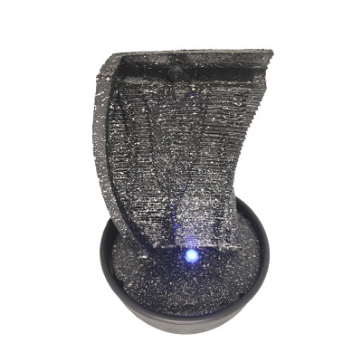 Fonte decorativa interior preta com base redonda e luz azul