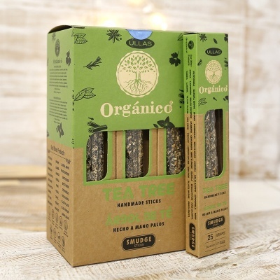 Embalagem verde e castanha de sticks de Tea Tree feitos à mão com texto de produto e marca