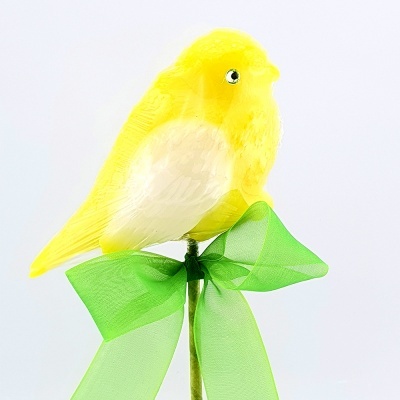 Pássaro decorativo amarelo com laço verde