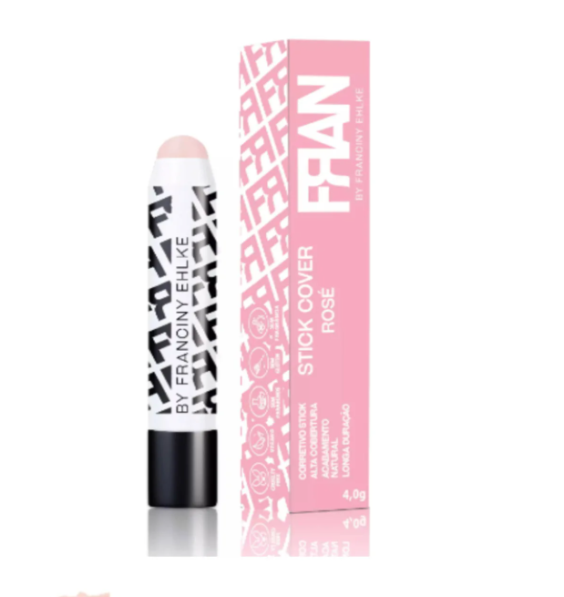 Stick de cobertura com embalagem rosa e branca com padrão gráfico e texto visível