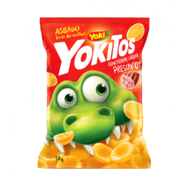 Pacote vermelho de snacks Yokitos com crocodilo verde e texto em português.