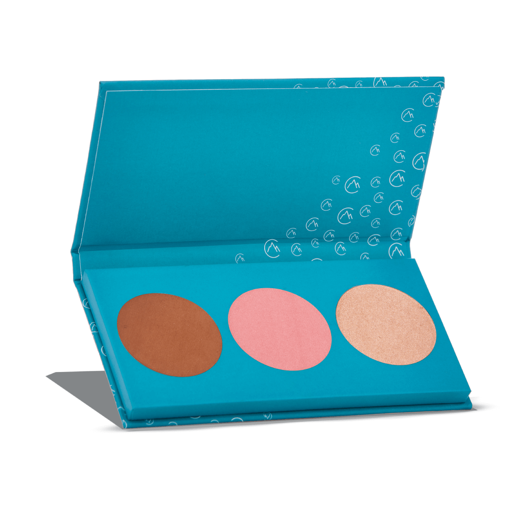 Paleta de maquilhagem azul com três pós compactos de cores castanho, rosa e dourado