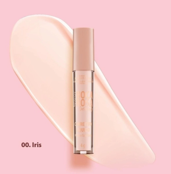 Corretor facial 00. Iris em tubo com tampa rosa claro sobre fundo rosa com textura creme