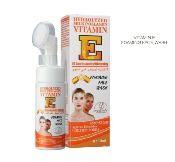 Produto foaming face wash Vitamina E com embalagem e caixa em branco e laranja com texto em inglês e árabe