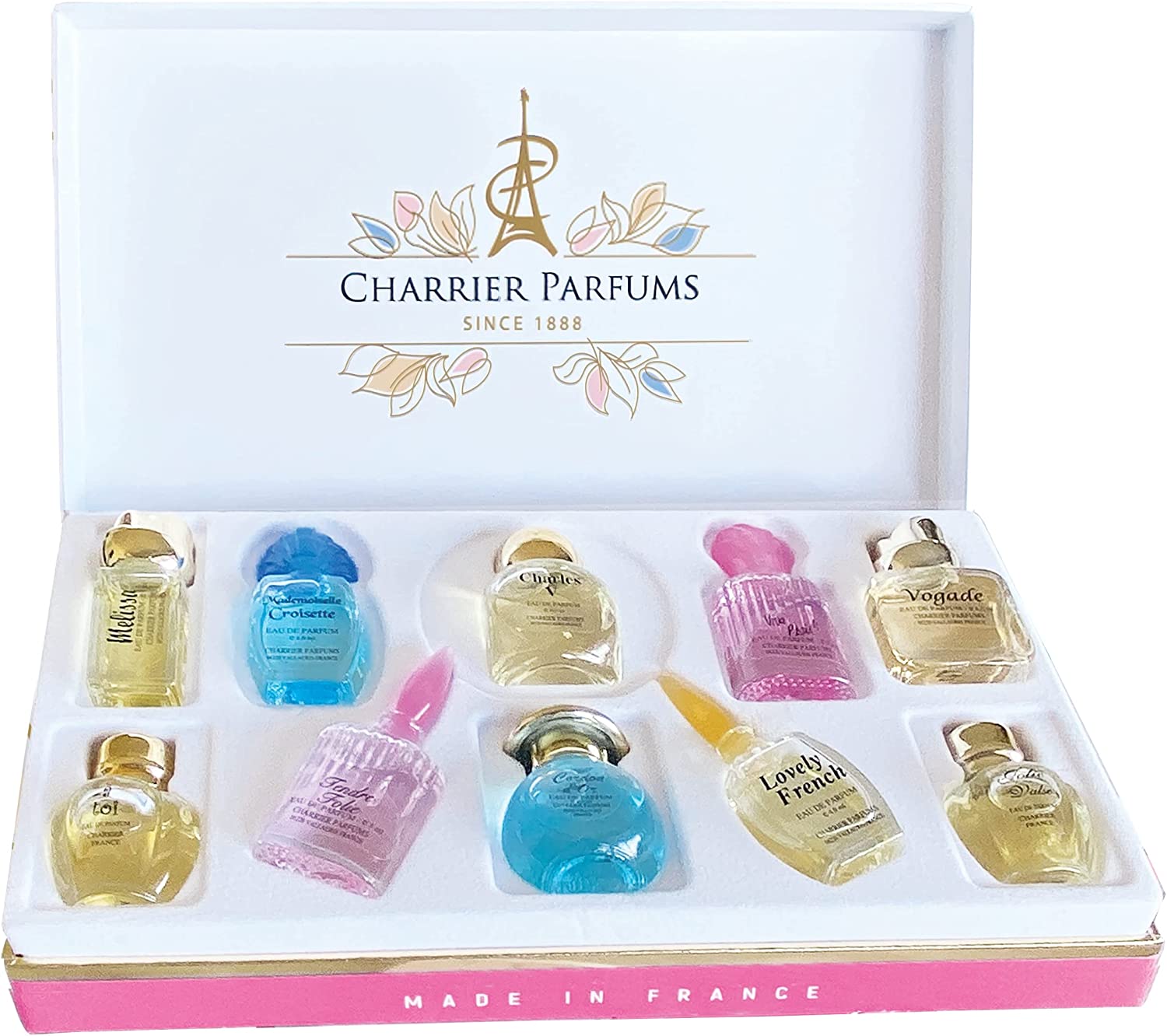 Conjunto de miniaturas de perfumes Charrier Parfums em caixa branca com detalhes dourados e rosa