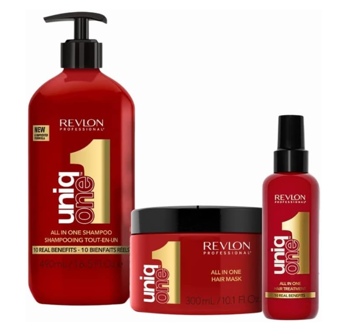 Produtos de cuidado capilar REVLON uniq one em embalagens vermelhas com texto dourado e branco