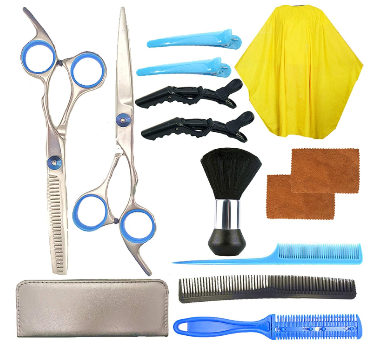 Conjunto para cabeleireiro com tesouras, presilhas, capa amarela, escova, toalhas, pentes e estojo cinzento.