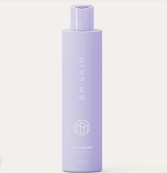 Frasco lilás alto com tampa roscada de produto B M SKIN MELTGRAPE CLEANSING OIL