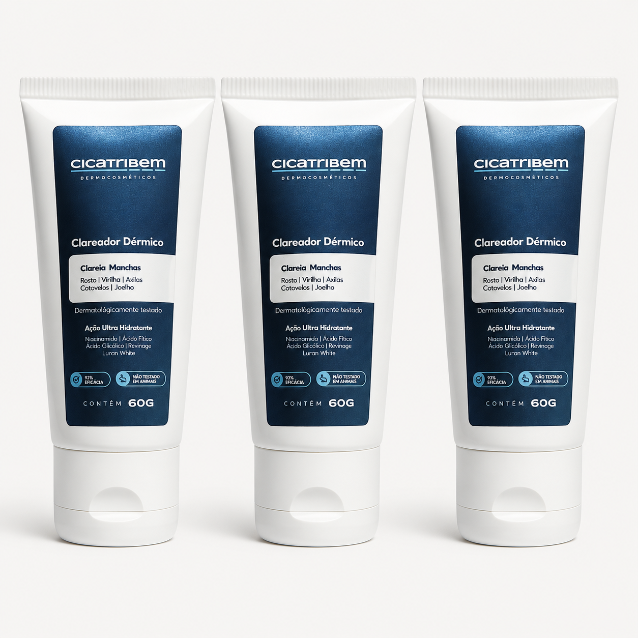 Três tubos brancos de creme Clareador Dérmico Cicatribem com rótulo azul escuro