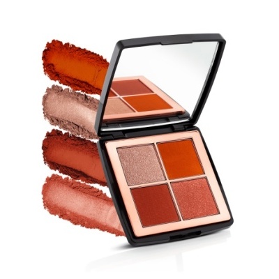 Paleta de maquilhagem com quatro sombras em tons terra e laranja compacta com espelho