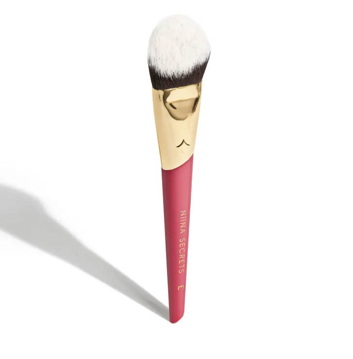 Pincel de maquilhagem com cabo vermelho e suporte dourado