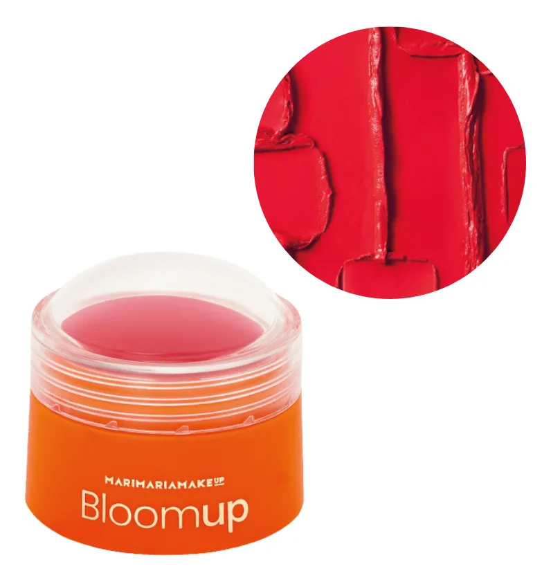 Frasco laranja com tampa transparente e produto vermelho