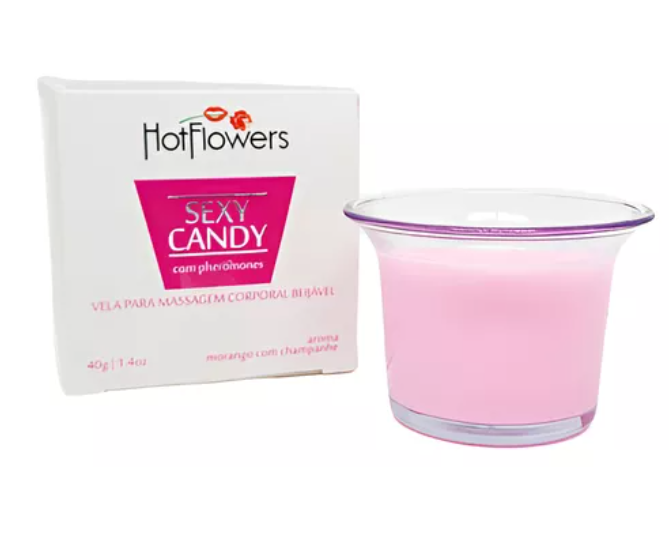 Vela para massagem corporal Hot Flowers Sexy Candy em embalagem branca com vela cor de rosa em vidro.