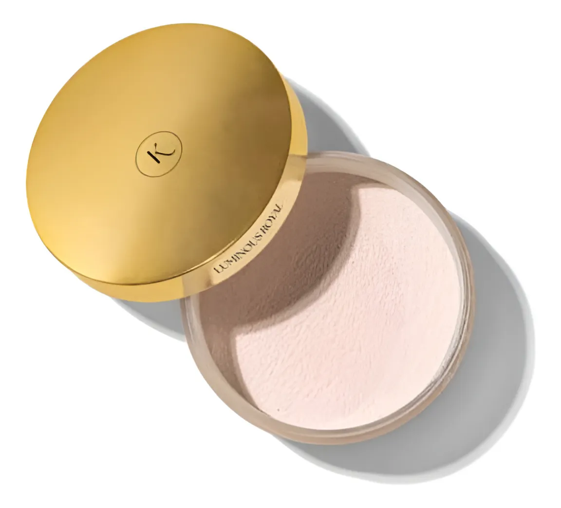 Pó solto em embalagem redonda com tampa dourada