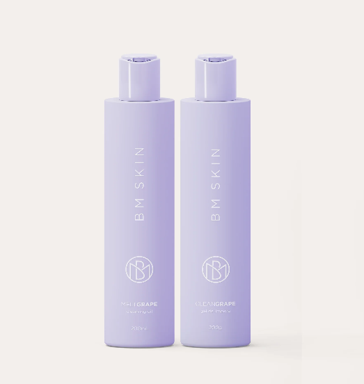Dois frascos de produto lilás BM SKIN com texto PHILGRAPE e CLEANGRAPE.