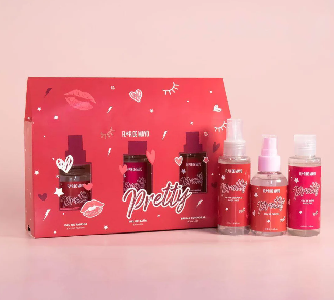 Conjunto de produtos de beleza Pretty em embalagens vermelhas e rosa sobre fundo rosa