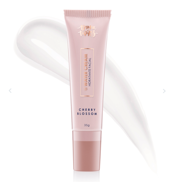 tubo de creme hidratante facial rosa com texto dourado e preto