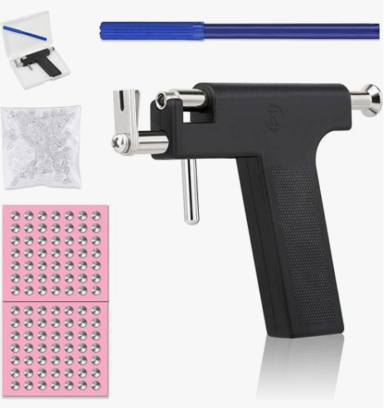 Conjunto para piercings com pistola preta, piercings metálicos, saco de peças e caixa branca