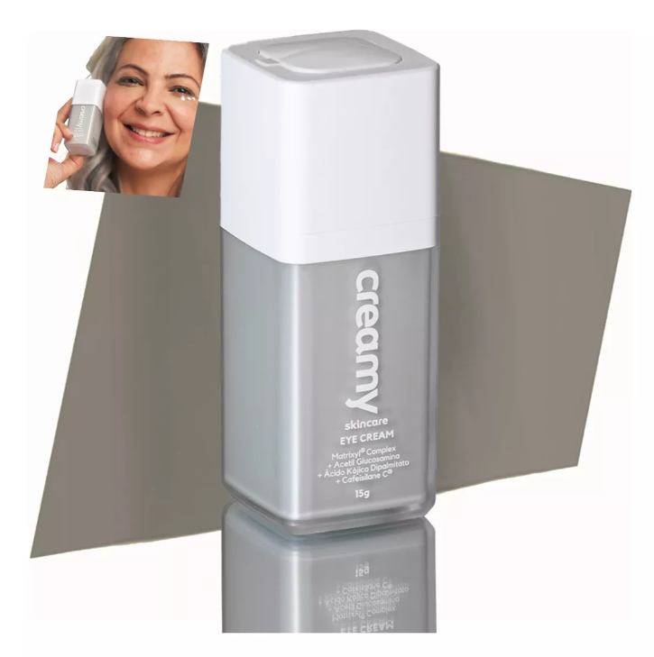 Frasco de creme para olhos creamy em fundo cinzento com mulher sorridente segurando o produto