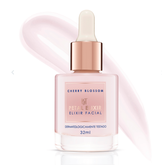 Frasco de elixir facial cor rosa claro com conta-gotas e tampa dourada