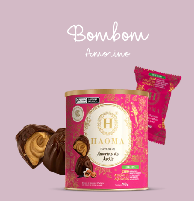 Lata rosa com bombons de chocolate e embalagem individual rosa