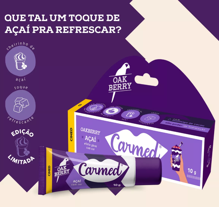 Embalagem e tubo do produto Carmed Oakberry açaí 10g em roxo e branco com texto promocional em fundo roxo.