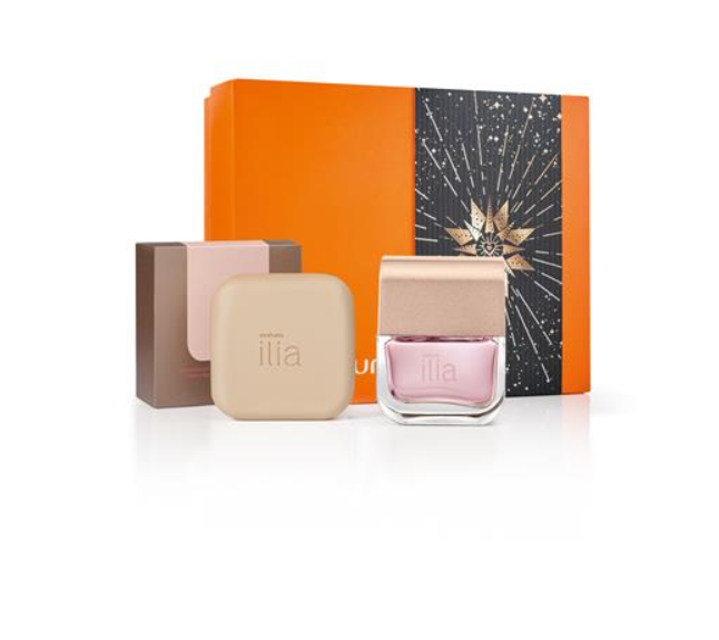 Conjunto de cosméticos Ilia com frasco de vidro, embalagem bege e caixa laranja decorada