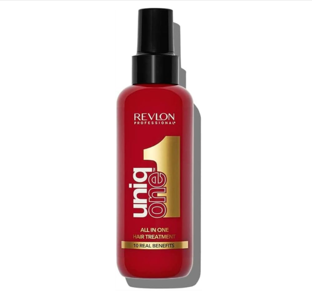 Frasco spray vermelho e preto de tratamento capilar Revlon uniq one
