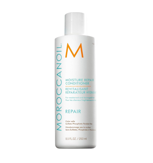 Frasco branco de condicionador Moroccanoil Moisture Repair com texto azul e laranja