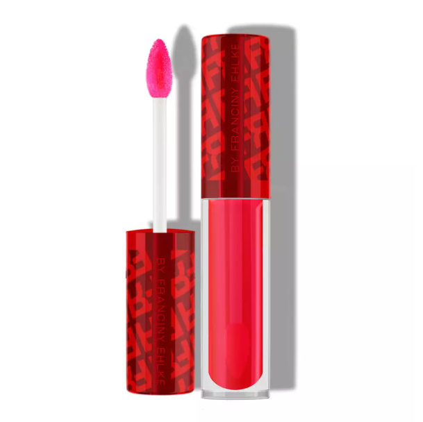 Batom líquido vermelho com aplicador de esponja rosa e embalagem com padrão vermelho com letras.