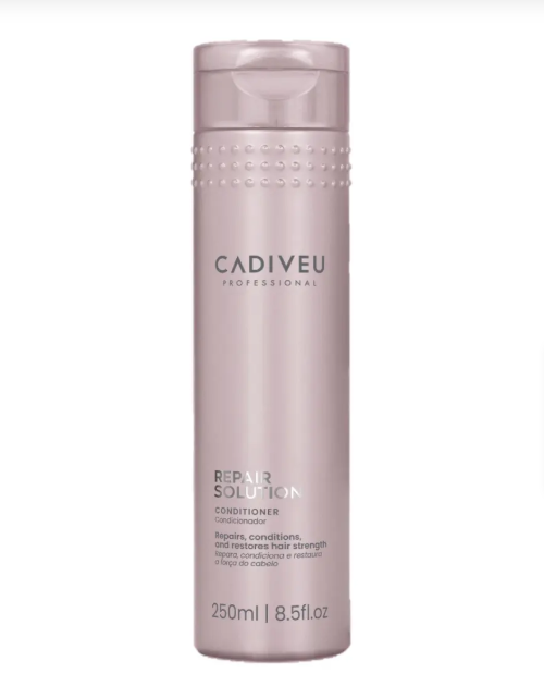 Frasco rosa claro de condicionador CADIVEU PROFESSIONAL REPAIR SOLUTION