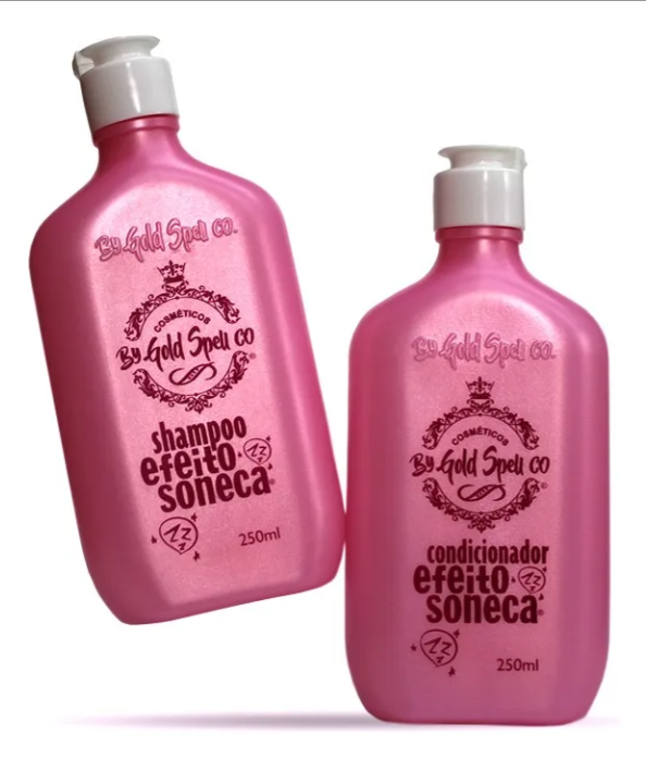 Duas embalagens rosas de shampoo e condicionador com texto em castanho