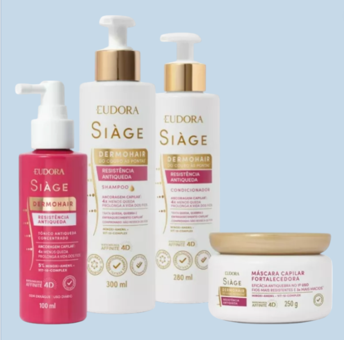 Produtos capilares Eudora Siàge Dermohair em embalagens brancas e detalhes vermelhos e dourados