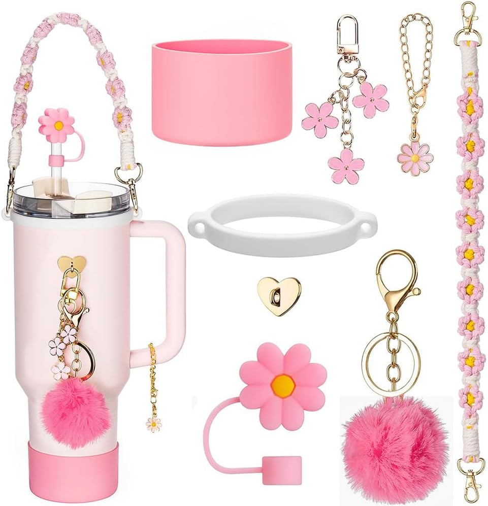 Garrafa rosa com acessórios decorativos de flores e pompom