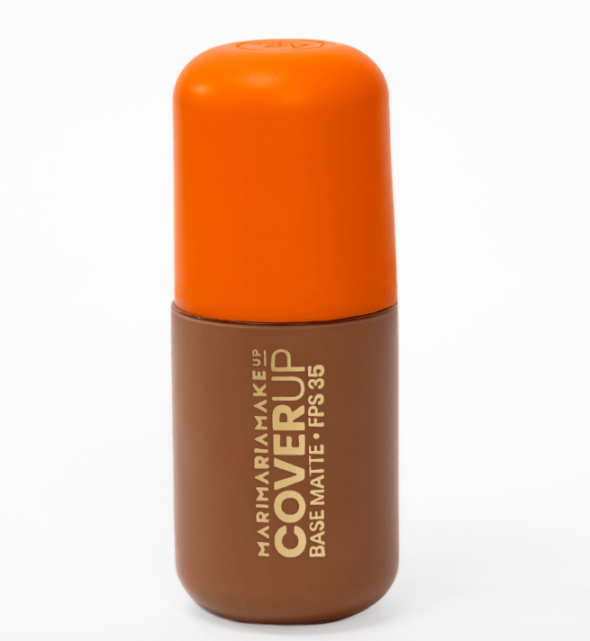 Frasco de base mate COVER UP da MARIAMA MAKEUP com tampa laranja e corpo castanho