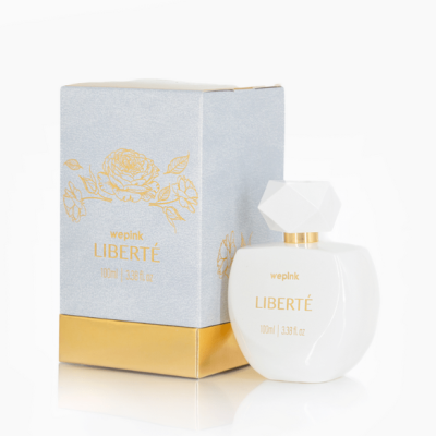 Frasco branco de perfume LIBERTÉ com caixa cinzenta e dourada