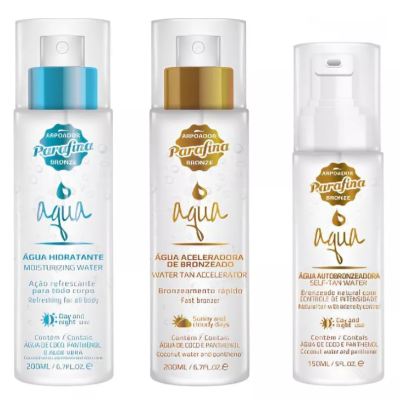 Três frascos de plástico transparante com produtos bronzeadores Arpoador Parafina Bronze em fundo branco.