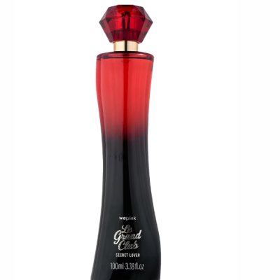 Frasco de perfume vermelho e preto com tampa facetada e texto branco.