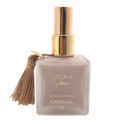 Frasco de vidro bege com tampa dourada e tassel para produto de beleza